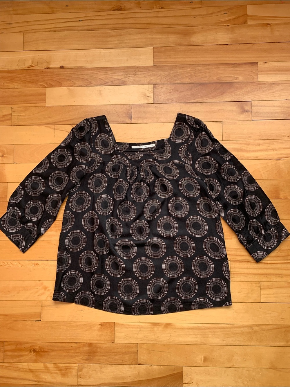 Women’s square neck black blouse with Circular Print, mix of cotton and silk.